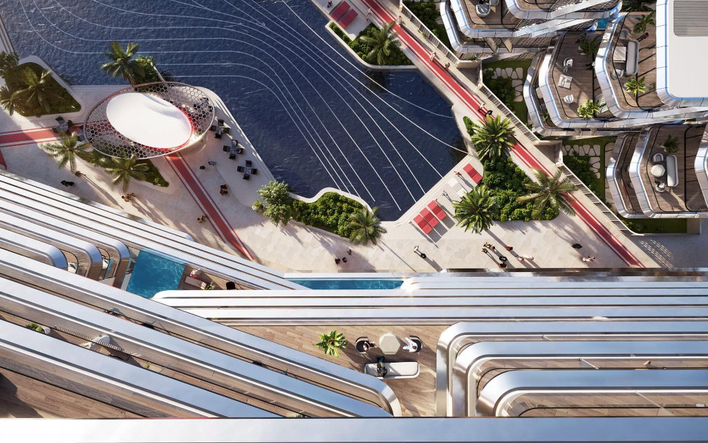 Aerial view of the cascading balconies of Tonino Lamborghini Residences over the water