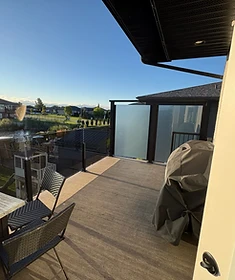 Custom glass deck railing and privacy screen installation in Winnipeg, Manitoba