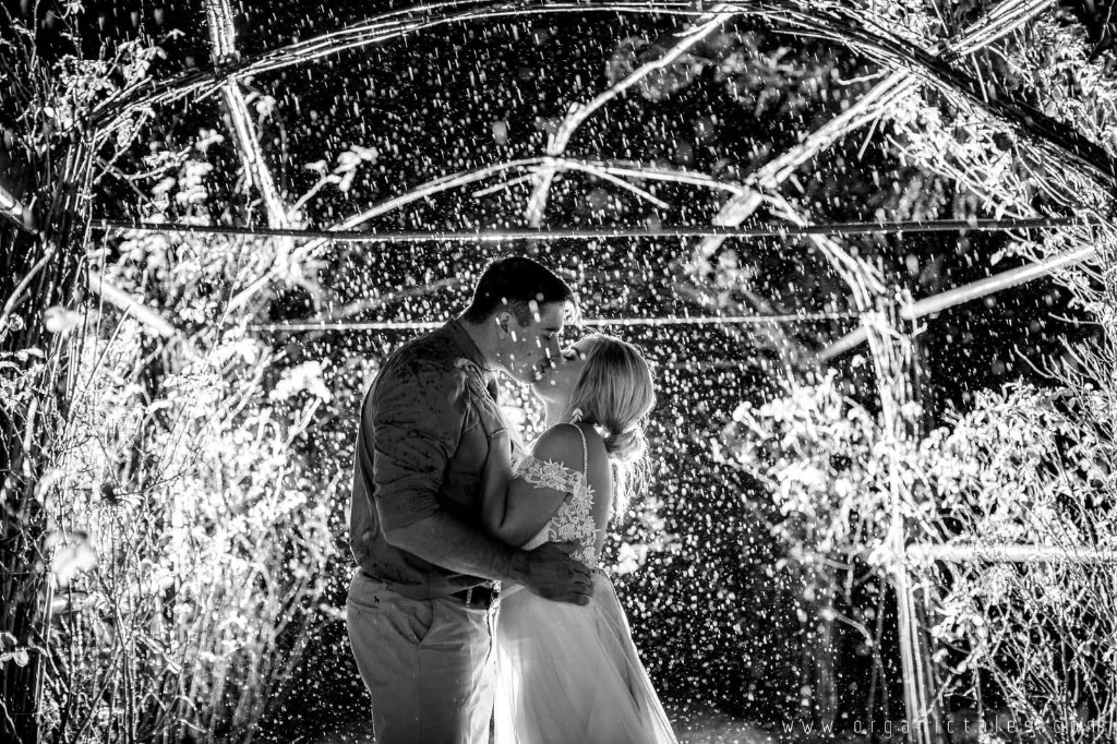 Rain kiss under arbor