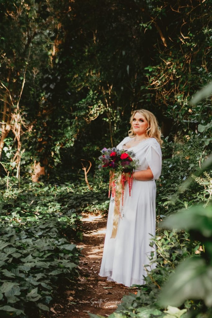 Bride on forest path