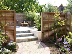 Modern garden with cedar slat fencing