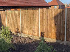 Lap panel fence installed in a Surrey garden