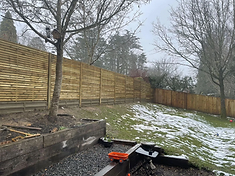 Cedar horizontal slat fence installed in Farnham