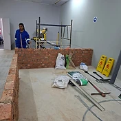 Female learner in bricklaying training
