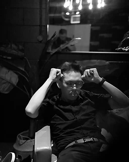 Black and white portrait of a band member deep in thought