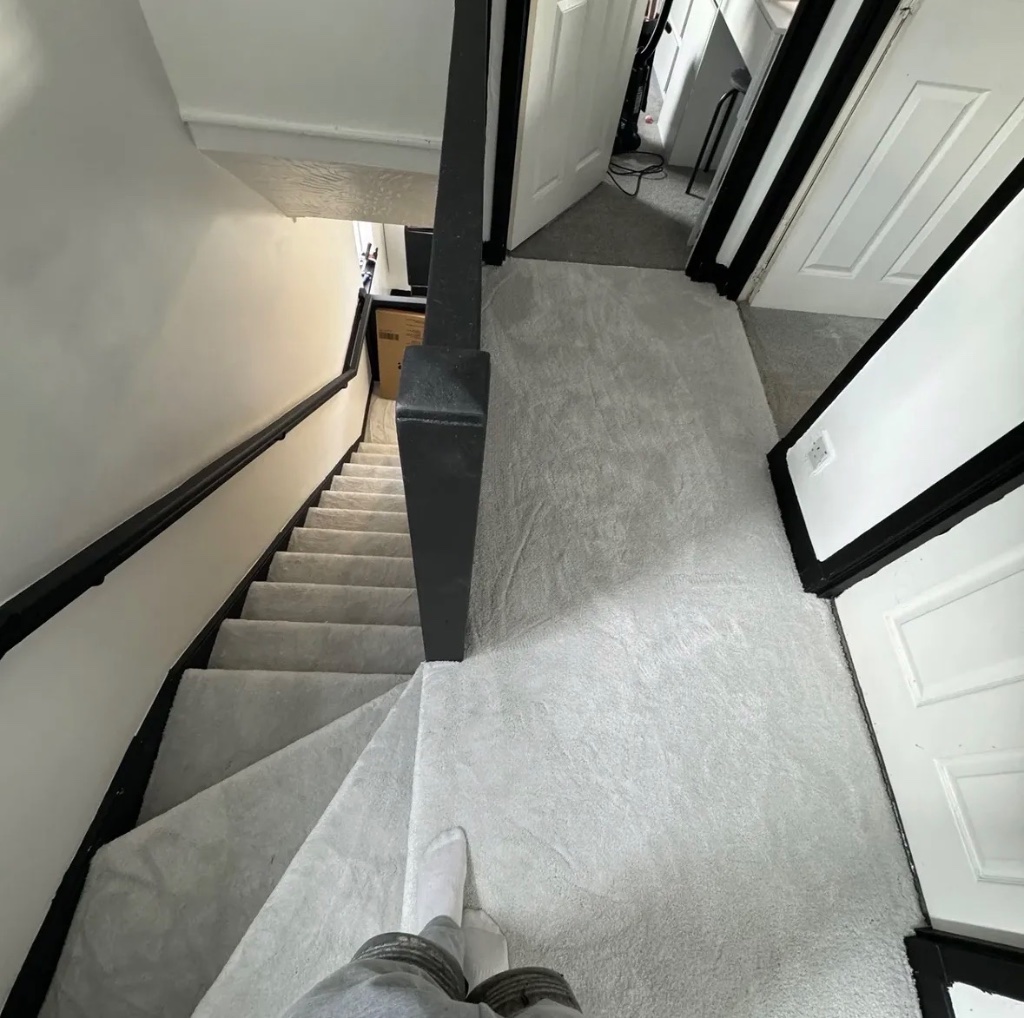 Grey carpet fitted on stairs and hallway