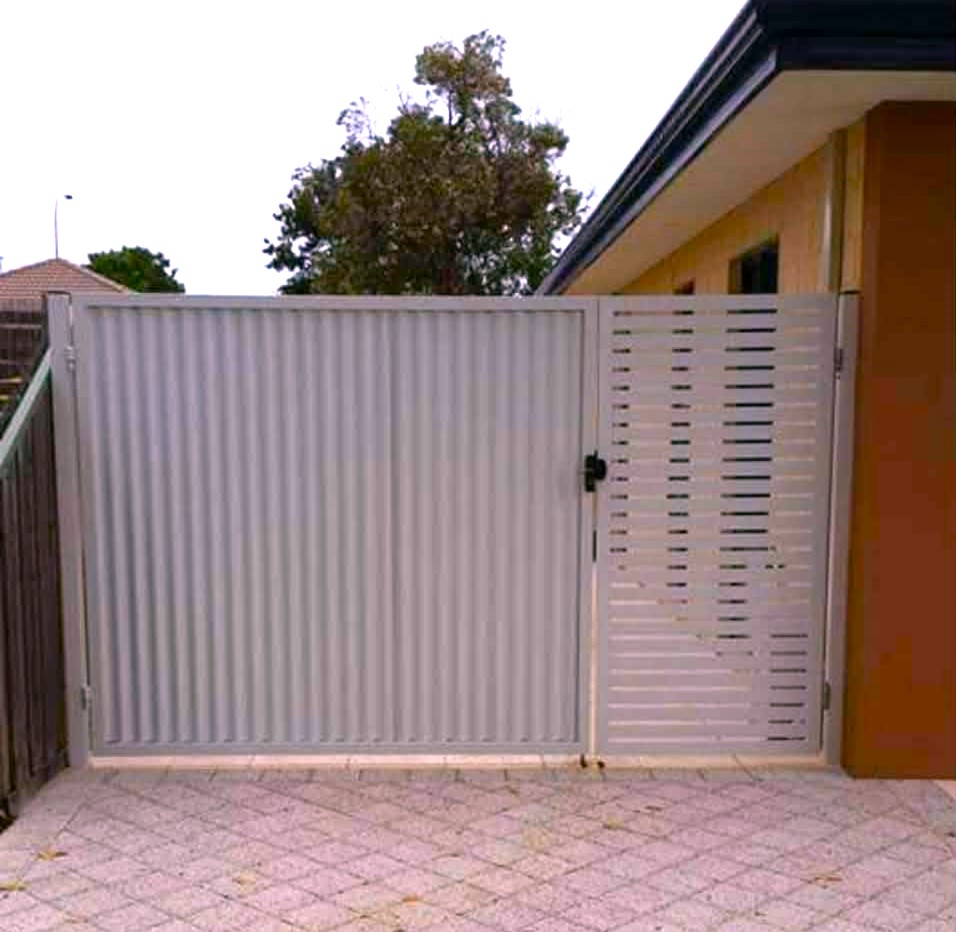 Large black aluminium double swing gate with horizontal slats at a residential driveway