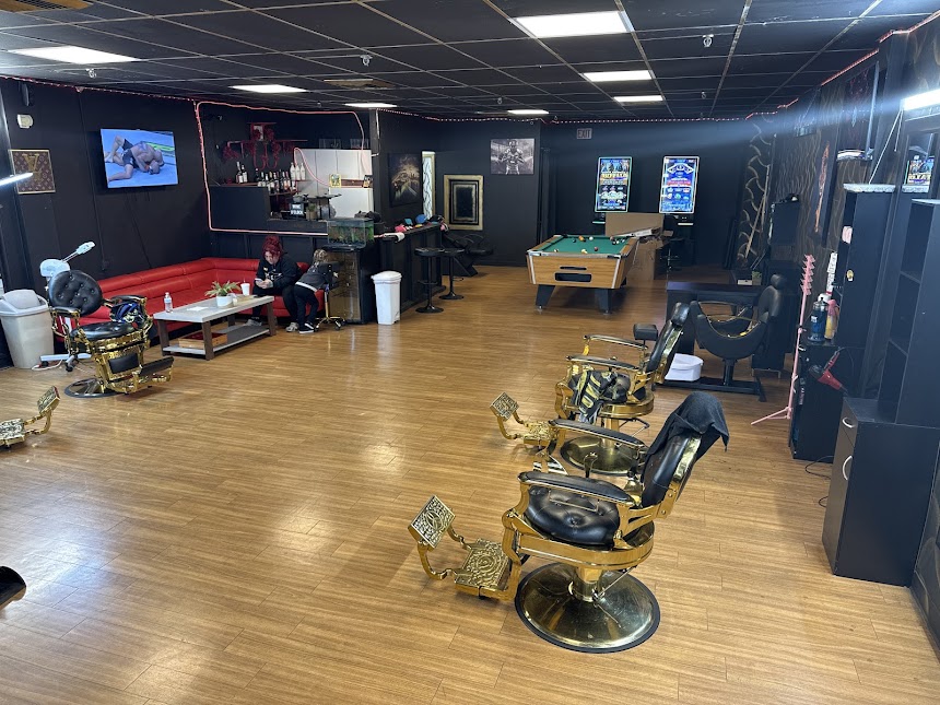 Golden Flow Barbershop interior with gold barber chairs