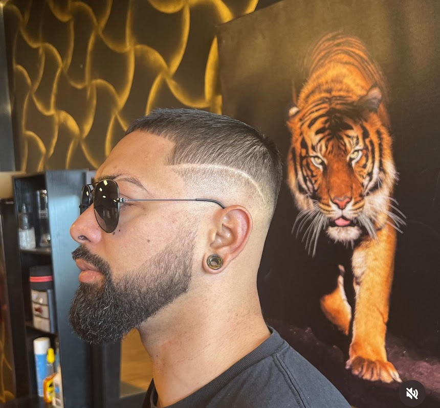 Clean fade with beard grooming