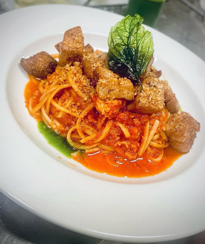 Mia Via braised short rib over rigatoni with arugula