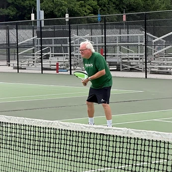 Don coaching at the net