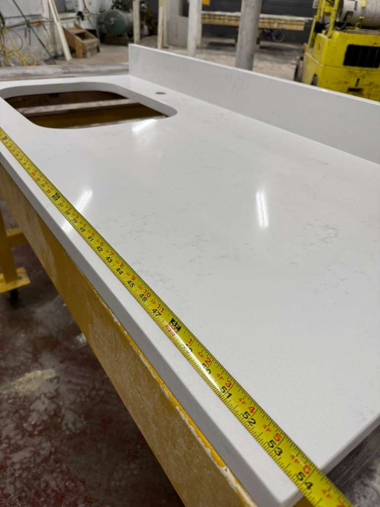 Polished white quartz slab precision fabrication shop