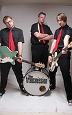 The Transmission three-piece band studio portrait
