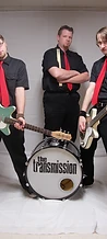 The Transmission three-piece band studio portrait