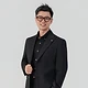 Danny Chua, Financial Consultant, smiling professionally in a bright studio setting