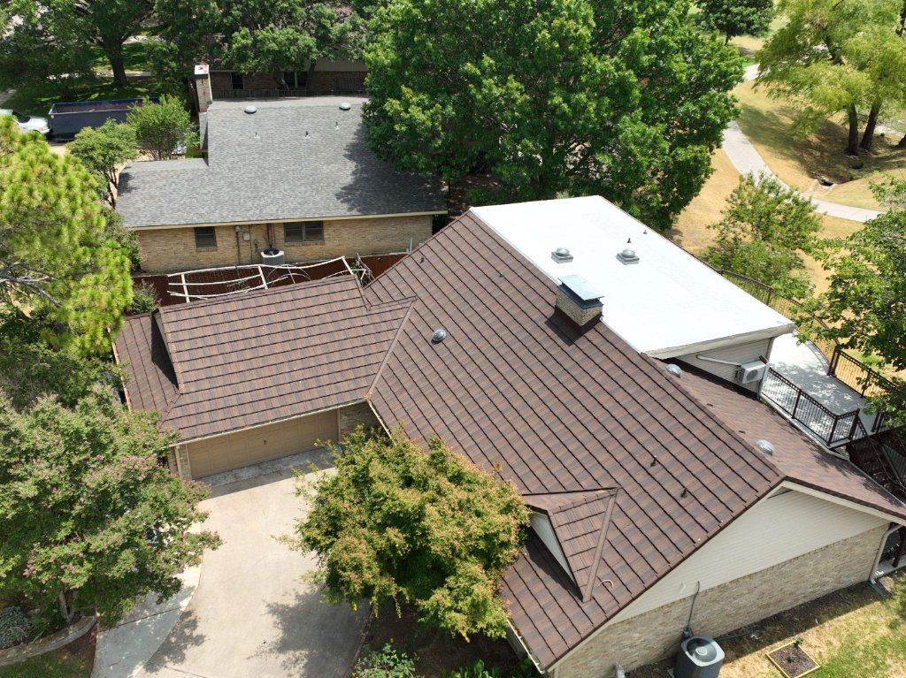 Richardson Texas Stone Coated Steel Roofand Modified Bitumen Roof Replacement Velux Skylights - Roof Replacement project photo by Becker Roofing and Exteriors