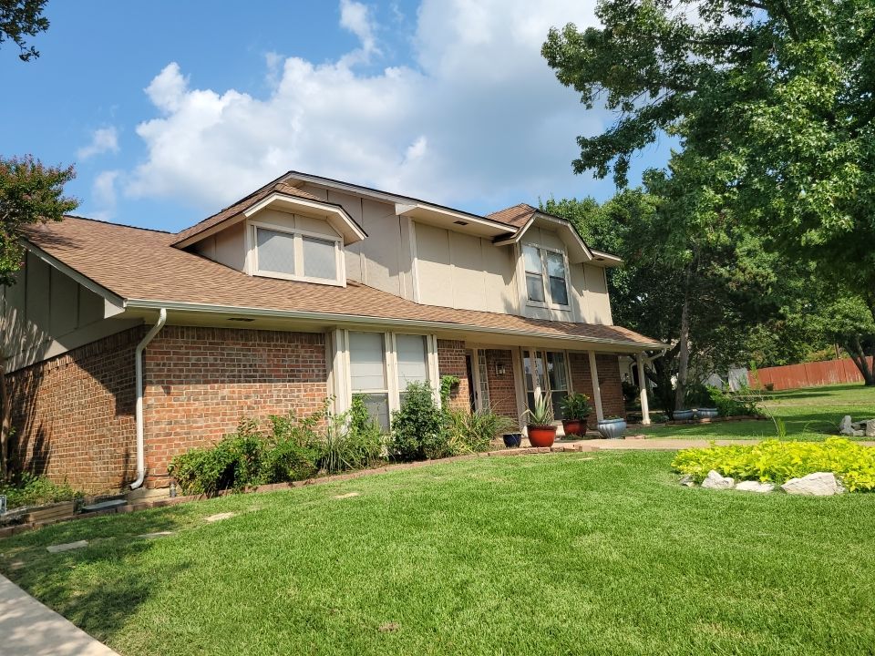 Trophy Club Traditional Brick Home New Architectural Shingle Roof Becker Roofing - Trophy Club Roofing project photo by Becker Roofing and Exteriors