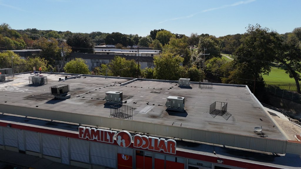 Commercial Flat Roof on a Retail Store in North Fort Worth - North Fort Worth Roofing project photo by Becker Roofing and Exteriors