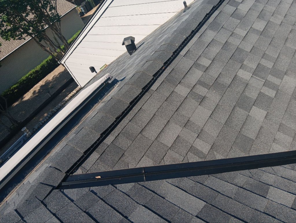 Bedford Ridge Vent Installation Attic Ventilation Becker Roofing - Bedford Roofing project photo by Becker Roofing and Exteriors