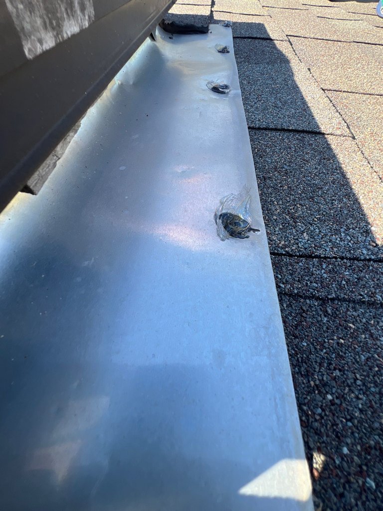 Arlington Texas Skylight Leak Repaired Exposed Nails Resealed - Roof Repair project photo by Becker Roofing and Exteriors