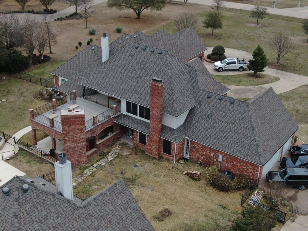 Allen Texas Repairafter40foot Tall Chimney Fellinto House Replaced Two Slopesofthe Roofingand Decking - Roof Repair project photo by Becker Roofing and Exteriors