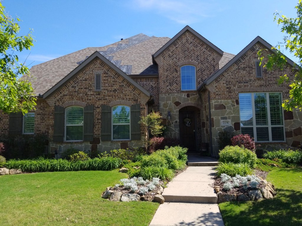 Allen Texas Tarpedup Hail Puncturesthat Caused Instant Leak - Emergency Roof Repair project photo by Becker Roofing and Exteriors