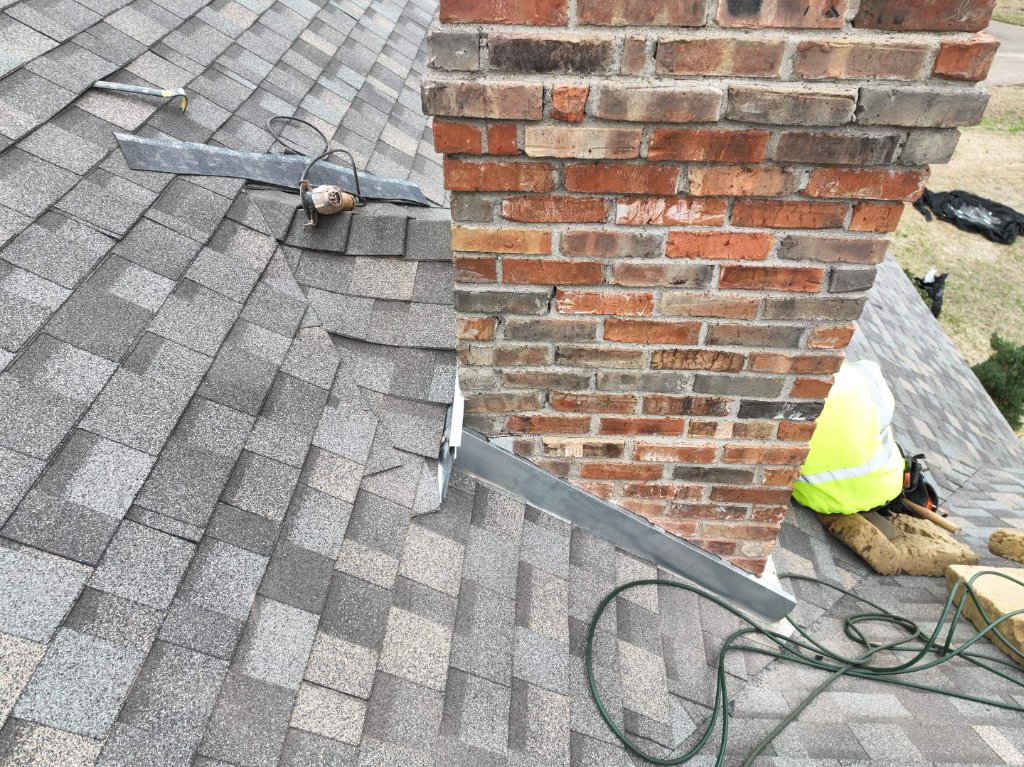 Southlake Texas New Chimney Cricket After Phototo Meet City Building Codes - Southlake Roofing project photo by Becker Roofing and Exteriors