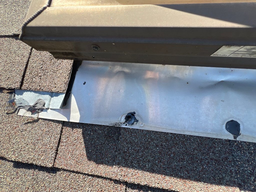 Exposed Nails Caulkedwithclear Sealant - Roof Repair project photo by Becker Roofing and Exteriors