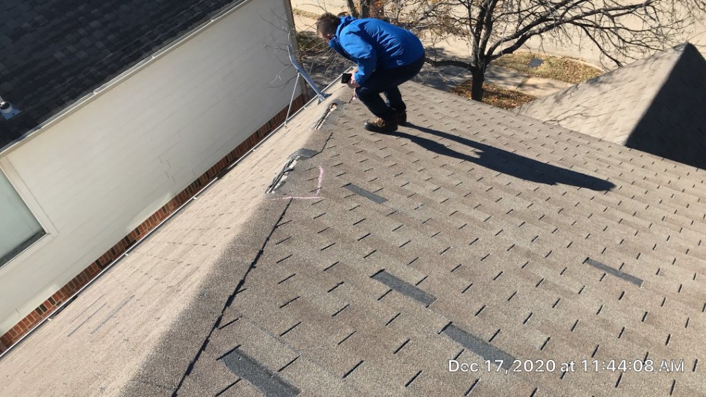 Becker Roofing Inspector Walking a Bedford Roof for Hail Damage - Bedford Roofing project photo by Becker Roofing and Exteriors