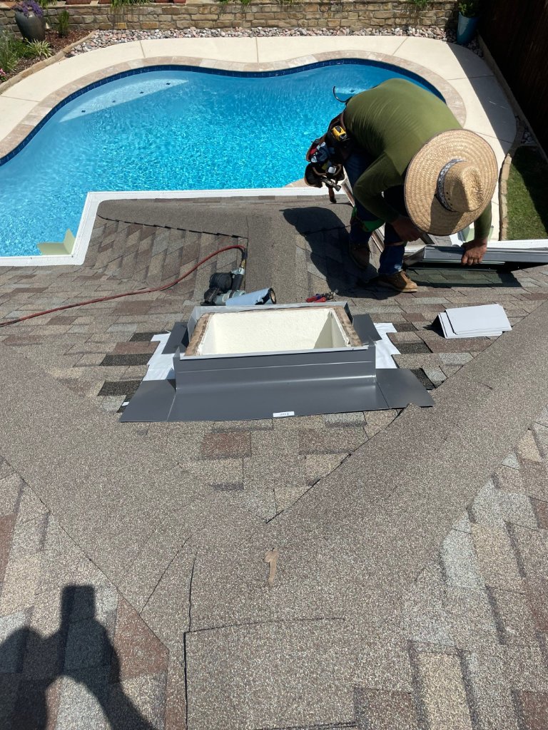 Skylight Installation on a Bedford Poolside Roof - Bedford Roofing project photo by Becker Roofing and Exteriors