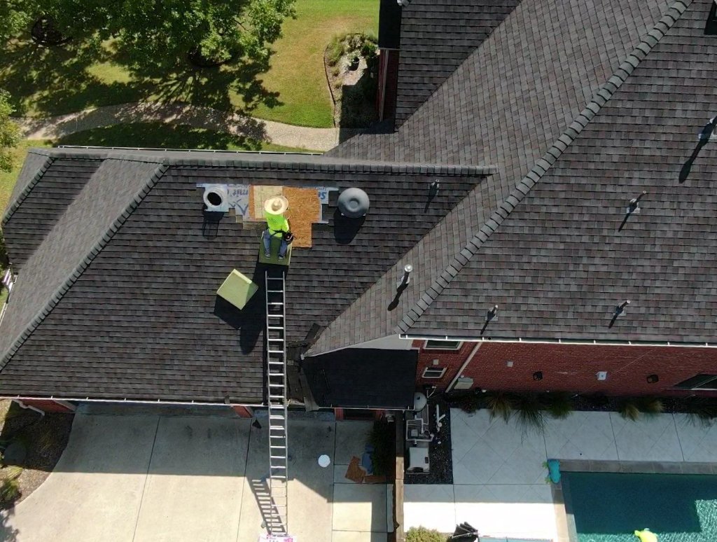 Trophy Club Roof Replacement Crew Installation Aerial Pool Home Becker Roofing - Trophy Club Roofing project photo by Becker Roofing and Exteriors