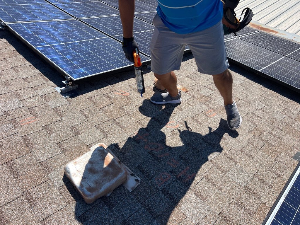 Arlington, TX roof repair underway while the homeowner waits on insurance to cover storm damage, by Becker Roofing and Exteriors