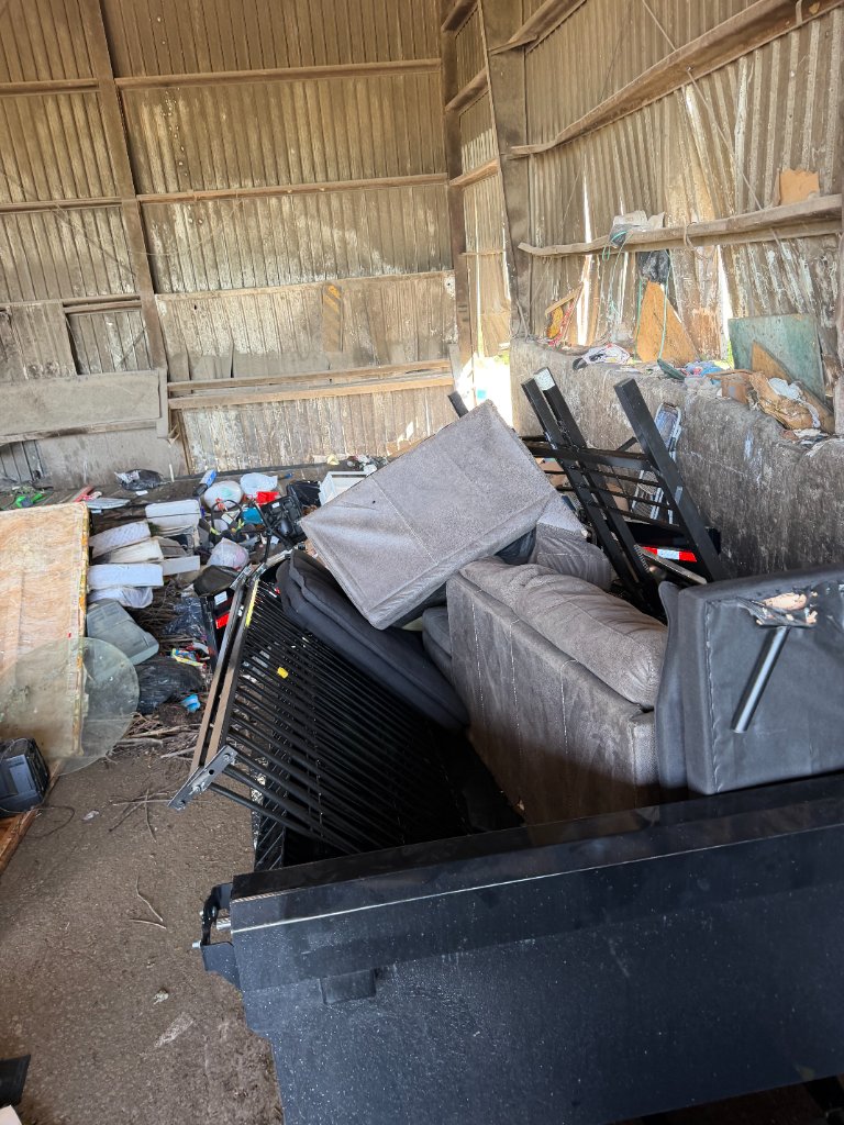Loaded trailer with mixed junk ready for haul away