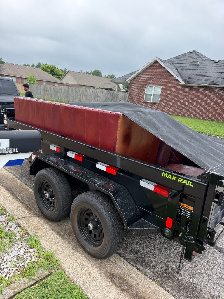 Truck with large trailer for commercial-scale hauling
