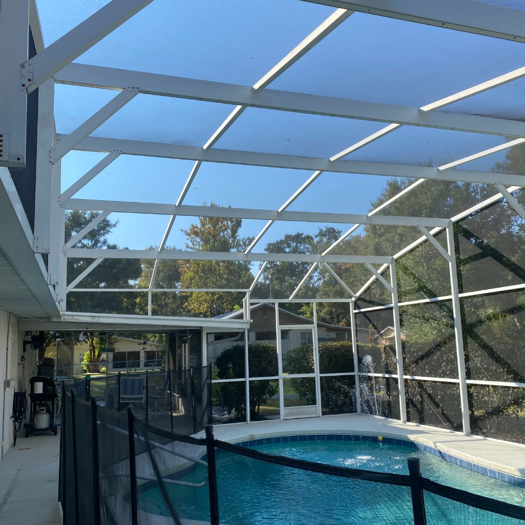 Patio rescreen white screen repair in pool cage roof in DeBary, FL