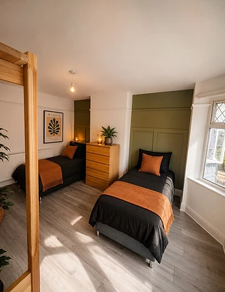 Warmly styled twin bedroom