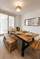 Dining room set for five guests