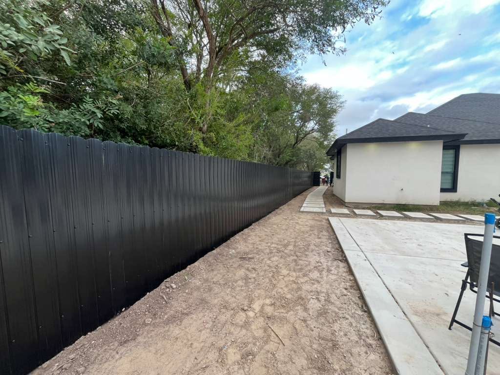 Professional metal fence installation by ETH Home Solutions
