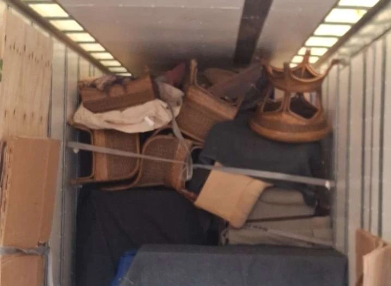 Inside a Summit Moving truck, packed with care