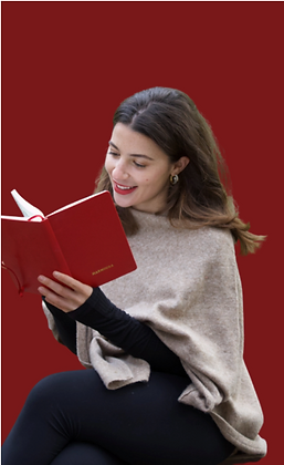 Mira reading, seated calmly