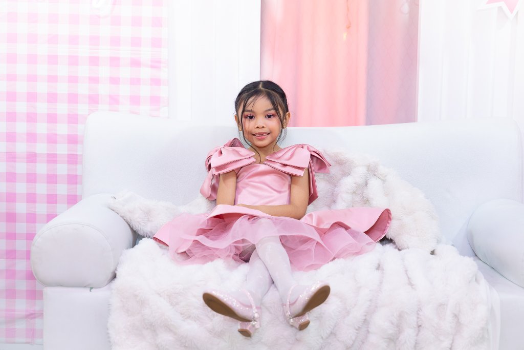 Little girl in princess dress at luxury birthday party in Abu Dhabi