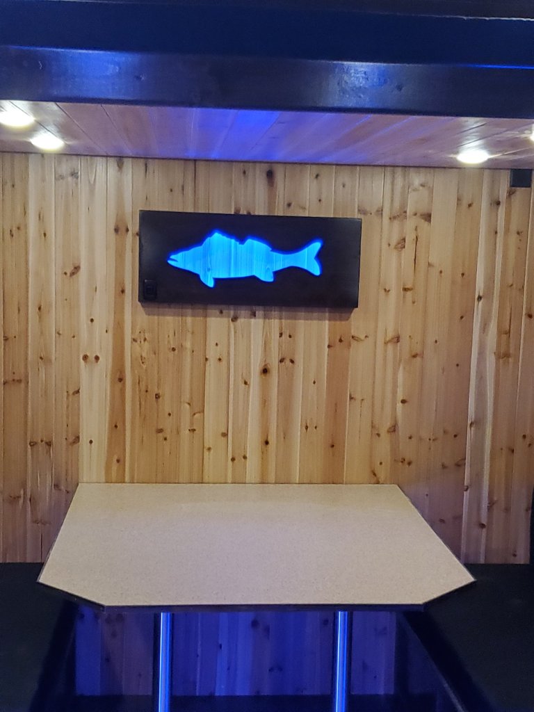 Custom interior with LED fish sign
