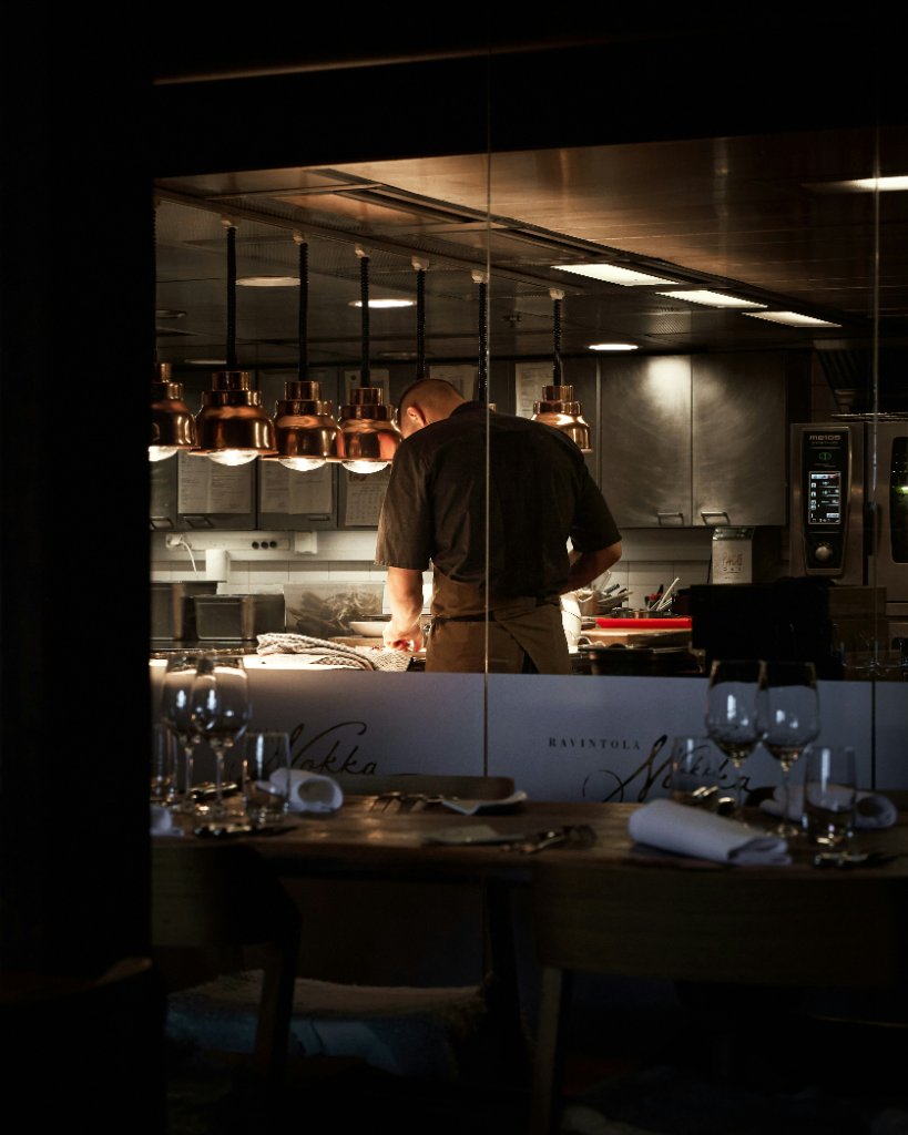 Chef preparing gourmet seafood dish