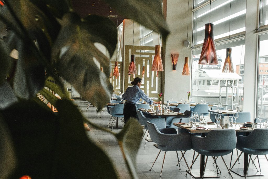 Modern fine dining interior with designer lighting