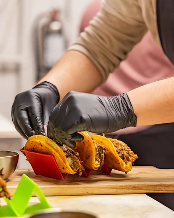 Tacos with fresh garnishes at Fiesta Tacos & Tequila