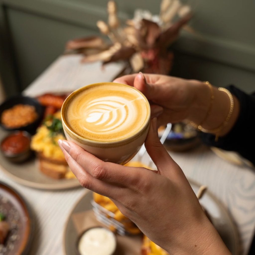 Latte art flat white at The Hideout Rosebud