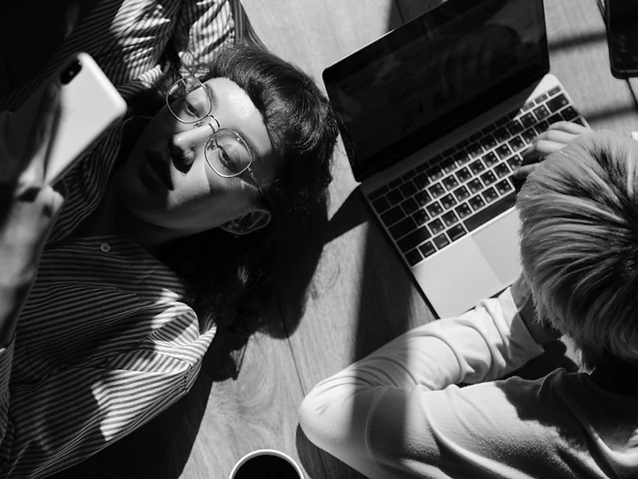 A focused moment of collaboration in the studio