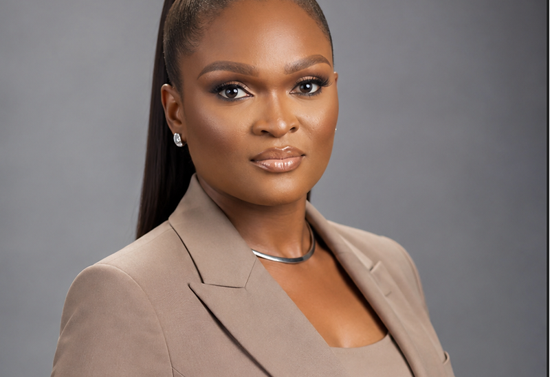 Mercy Zechariah in a taupe tailored portrait