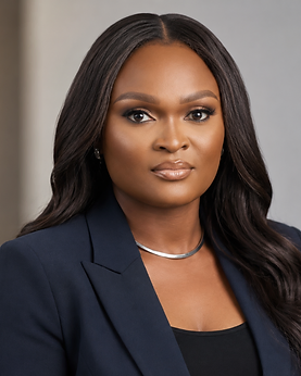 Mercy Zechariah in a navy tailored portrait