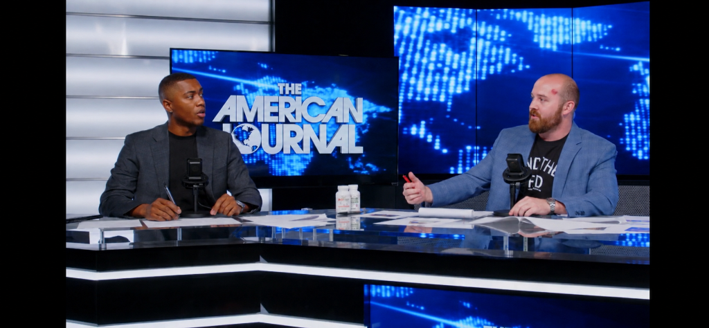 Tim Tompkins and Rex Jones at The American Journal desk
